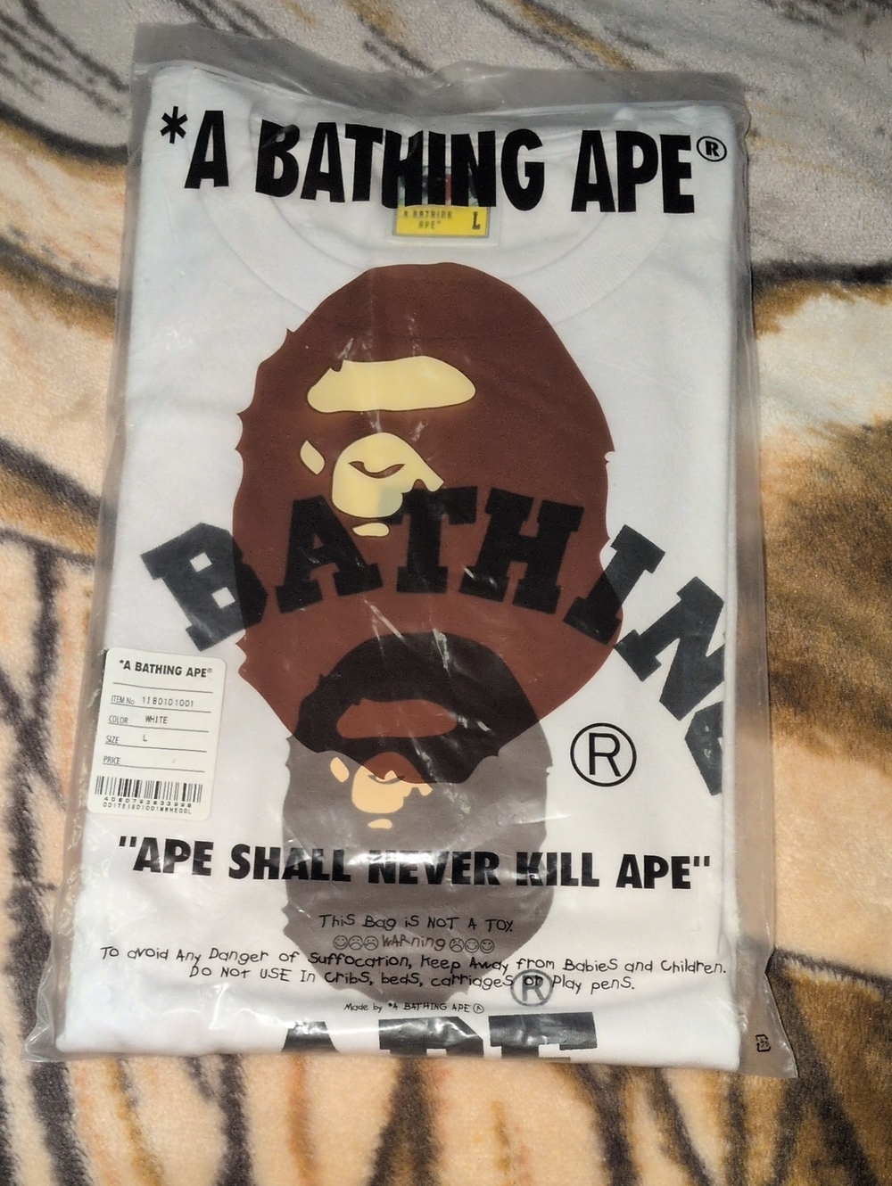 A Bathing Ape White Graphic Tee with Brown Ape Logo - Men